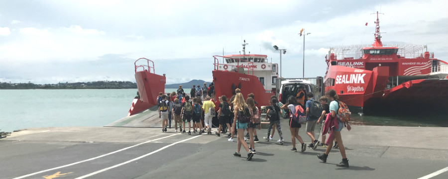 School group boarding SeaLink ferry at Half Moon Bay