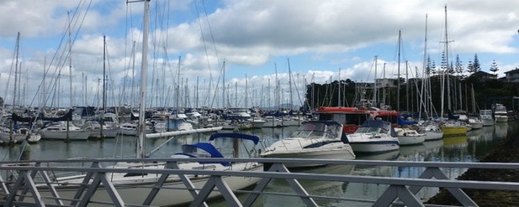 Yachts and SeaLink ferry in Pine Harbour Marina