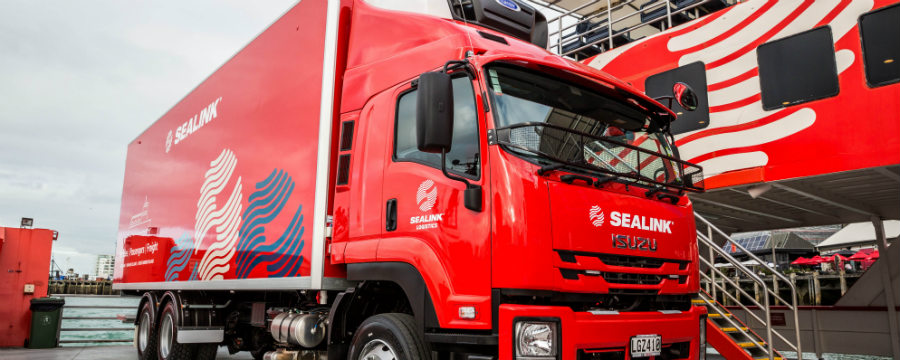 SeaLink logistics curtainsider truck at Half Moon Bay